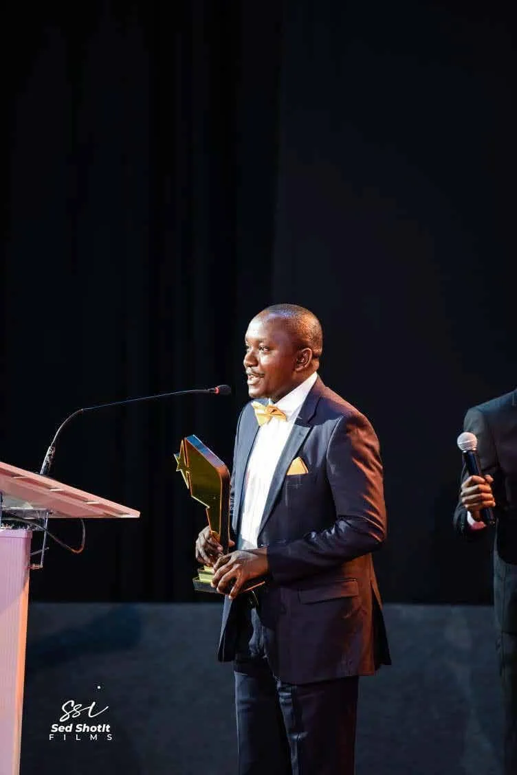 Wezesha Real Estate receiving the Best Realtor of the Year award