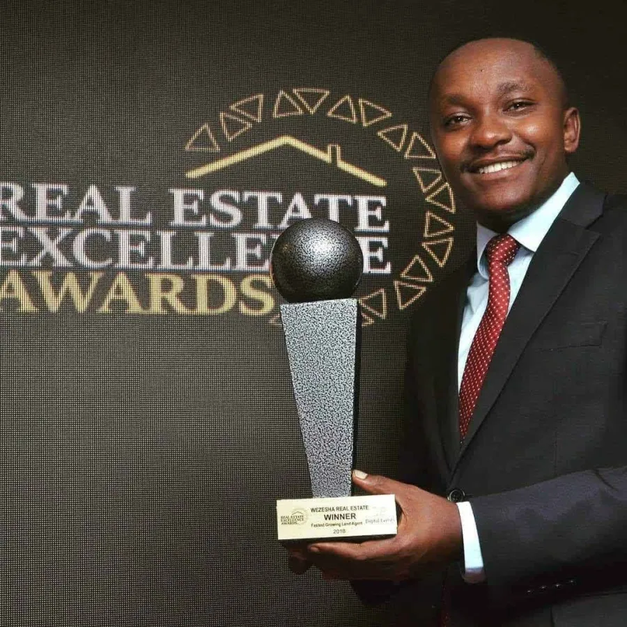 Wezesha Real Estate receiving the 2023 Real Estate Excellence Award