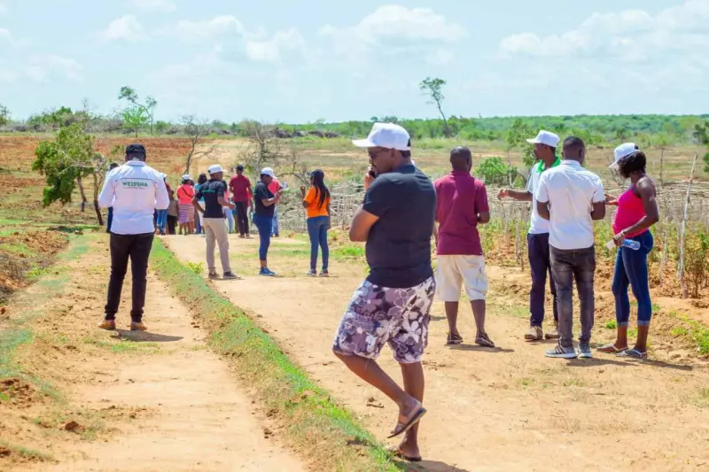 Site visit group touring the land
