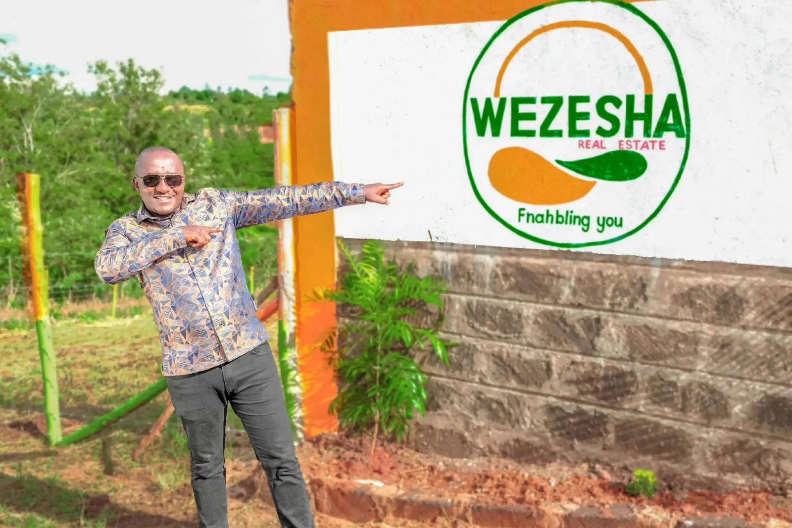 Wezesha sign at the Kenol Milimani project